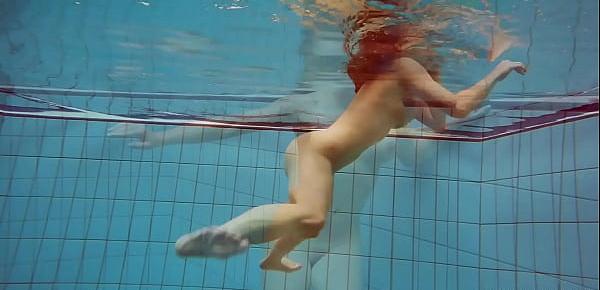 trendsBig tits petite babe Deniska swimming in the pool